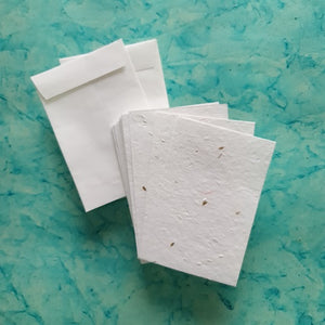 Plantable carrot seed paper in white colour with handmade paper envelope
