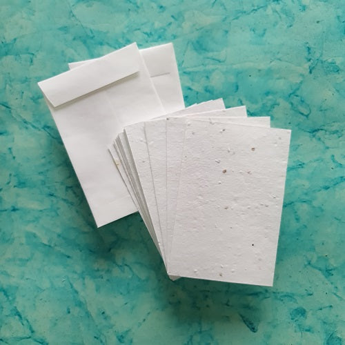 Plantable tomato seed paper in white colour with handmade paper envelope