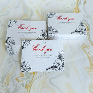 Plantable seed paper thank you cards with greeting notes printed in red and black colour ink