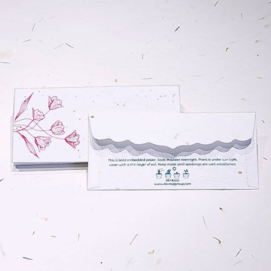 Cash money gifting envelope made of plantable seed paper with front side flower design printed with lock