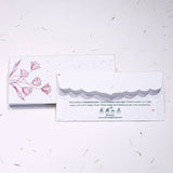 Cash money gifting envelope made of plantable seed paper with front side flower design printed with lock
