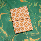 Orange fabric handmade paper diary with thread binding