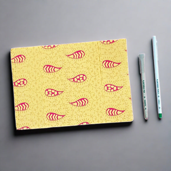 Handmade paper flower petal paper designer diary in yellow colour with golden prints with plantable pen and plantable pencils